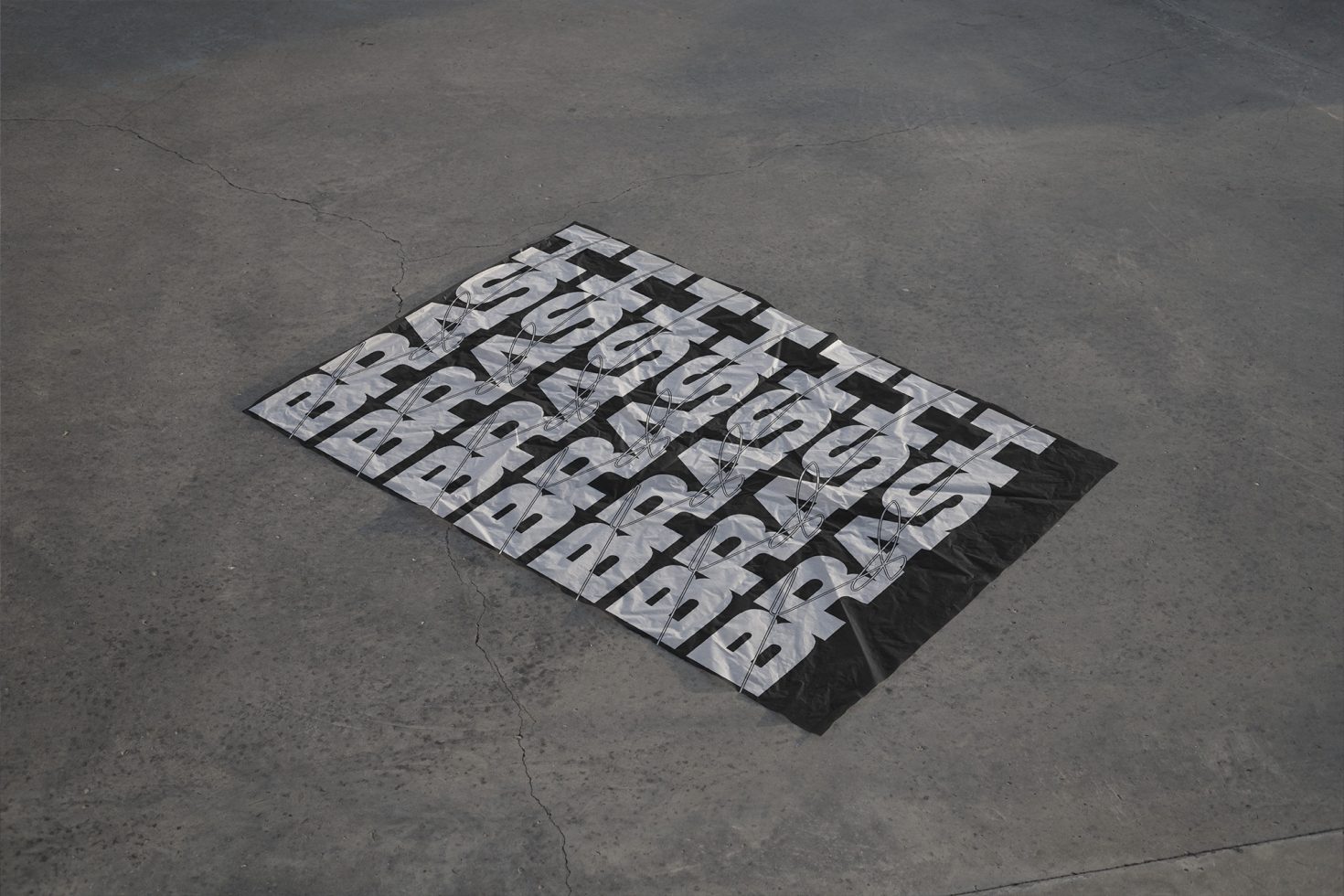 Unique font design mockup spread on ground, showcasing creative typography, suitable for graphic designers looking for inspiration.